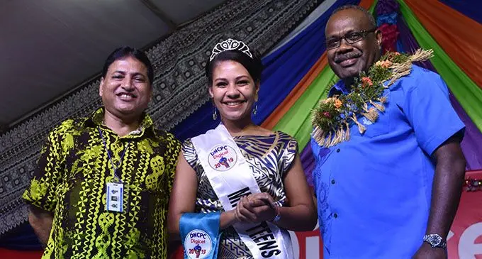 From Left: Digicel Duavata Northern Crime Prevention Carnival chairperson Satish  Kumar with the Teen winner Miss LICI Delilah Vosa and chief guest Deputy  Commissioner of Police Rusiate Tudravu during the crowning at  Subrail Park in Labasa on July 5,2019.  Photo: Shratika Naidu