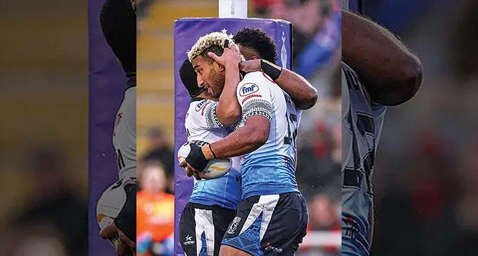 Vodafone Fijian Bati second row Viliame Kikau is congratulated by teammates after scoring a try during their match against Scotland on October 30, 2022. Photo: NRL