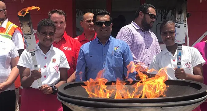 From left; Liviana Kula, Pacific Energy National Retail Manager Amit Maharaj and Vani Loloma during the Powerade Torch relay launch in Suva  on February  25,2019. Photo: Anasilini Natoga