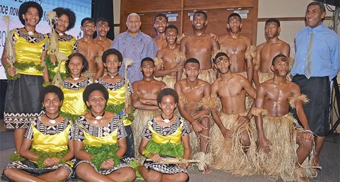 Prime Minister Voreqe Bainimarama (middle) with Ratu Sukuna Memorial School principal Napolioni Silatolu (right) and the school meke group on May 14, 2019, at the closing reception of the Third Climate Action Pacific Partnership Conference 2019 at the Grand Pacific Hotel. Photo: Ronald Kumar