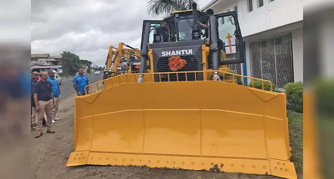 The permanent secretary for the Ministry of Public Works, Meteorological Services and Transport Paula Baleilevuka (pictured with a garland), attended the handing over of trucks and bulldozers at the Vision Motors Showroom on Grantham Road, Suva.