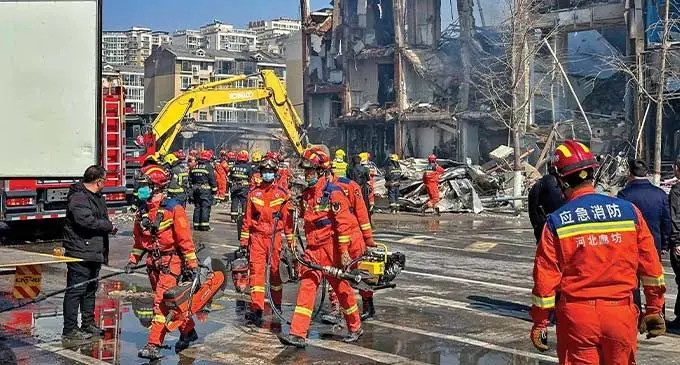 Firefighters work at the scene of the explosion in Yanjiao, Hebei province on Wednesday. Photo: SCMP