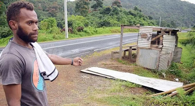 Jolame Tabualase shows the roofing iron that was used for roadblock near Naveidawa Settlement along Kings Road on August 18, 2020. Photo: Ronald Kumar