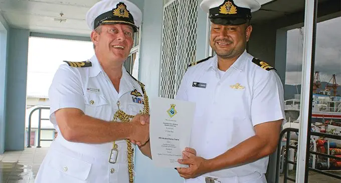 Lieutenant Jervis Robinson received his certificate from Commander Guy Haywood of the Royal Navy. Photo: Simione Haravanua.