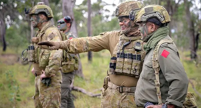 Major Aseri Rokoura of the RFMF (far right) being briefed on Exercise Diamond Sprint. Photo: 7th Brigade, Australian Army.