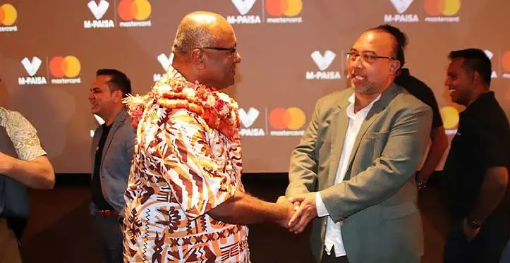 Minister for Trade, Manoa Kamikamica, with Vodafone Fiji chairman, Joe Taoi, during the launch of the M-PAiSA Mastercard in Suva this week. Photo: Josefa Babitu
