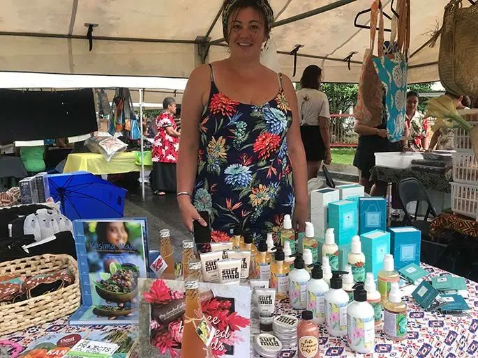 fj Laura Cahir of Fiji Beachhouse with a Pacific range of products on sale at Suva Roc Market yesterday. Photo: Frederica Elbourne 