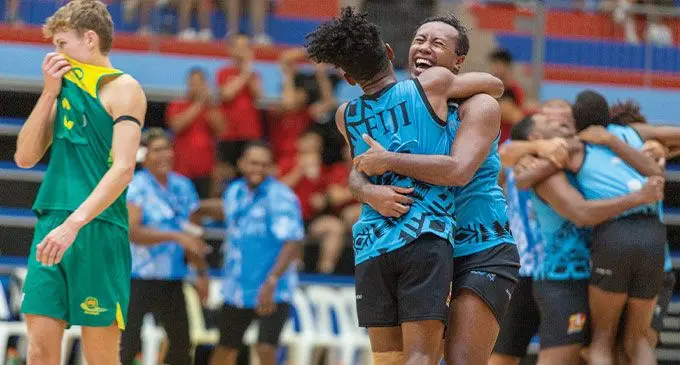 This marks the first time a Fiji men's netball team has toured since the 2004 International Men's Netball Championship in Melbourne, AustralÂ­ia. Captain Kitione Waqavonovono (facing camera) and vice captain Joseva Nawaqa celebrate their vicÂ­tory over Australia last night. Photo: Fiona Chong