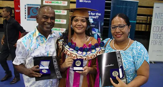 Jessica Work with her parents, Simon Krishna and Sina Pangalu after the USP graduation ceremony at the Vodafone Arena on March 31, 2023. Photo: Josefa Babitu