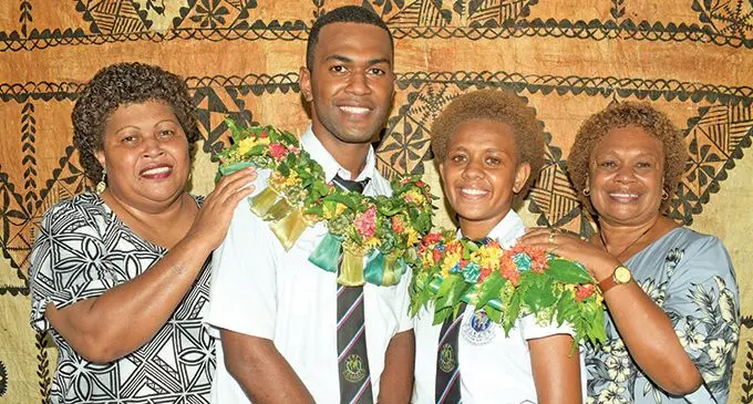 CMF College Head Boy Joape Tauva with mother, Atilatei Botei and Head Girl Mereoni Koroi with mother Elesi Koroi on May 4, 2022. Photo: Ronald Kumar