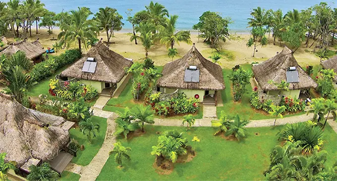 An aerial view of some of Uprising Fiji Resort’s bures.