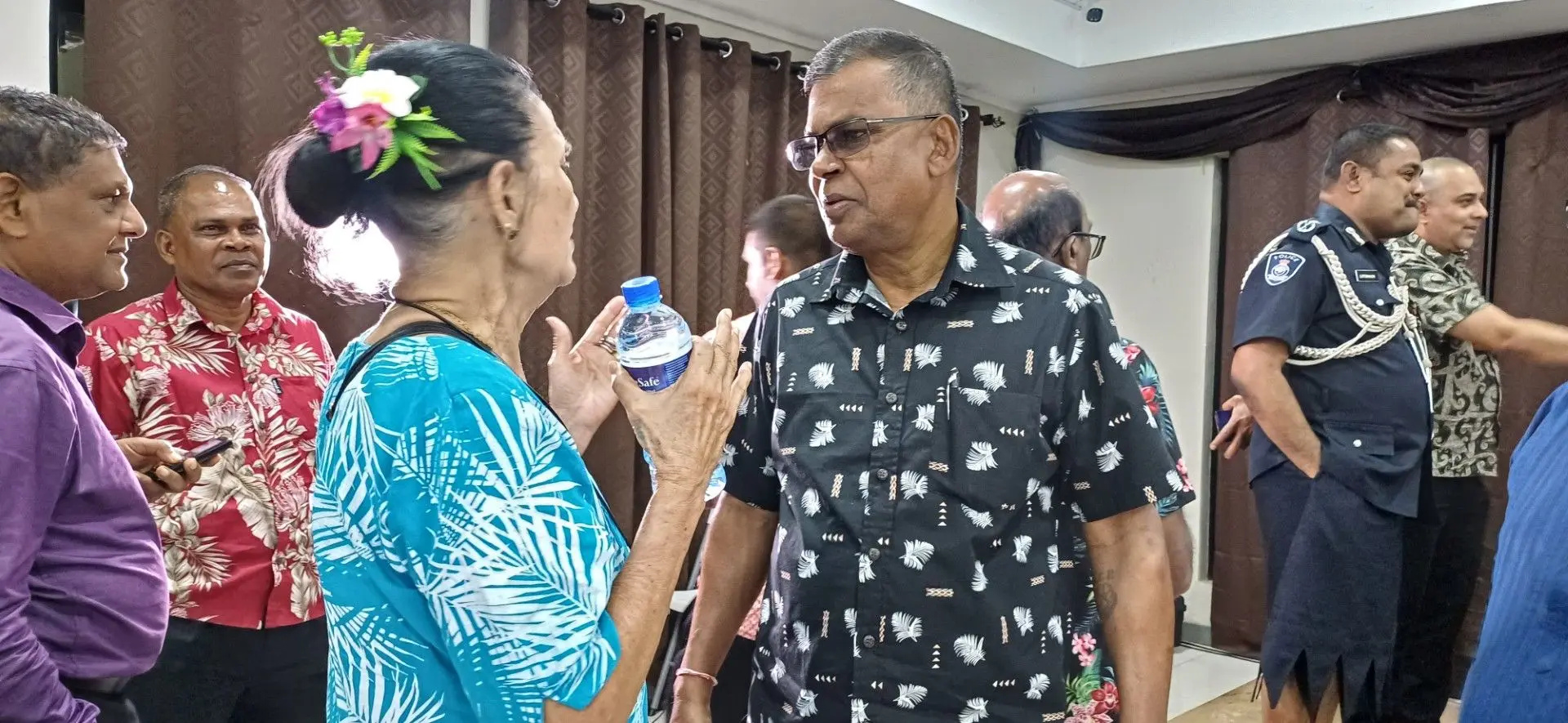 Deputy Prime Minister and Minister for Finance Biman Prasad (right) discusses a point with a participant of the town hall forum held at the Fiji Football Academy in Labasa on July 24, 2025. Photo: Shratika Naidu