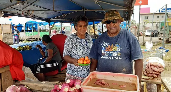Facing camera from left: Qali Tabaiwalu and Lesio at their stall in Nakasi.They pay a monthly rental fee of $100 to owners of the shopping mall.  Photo: Shalveen Chand