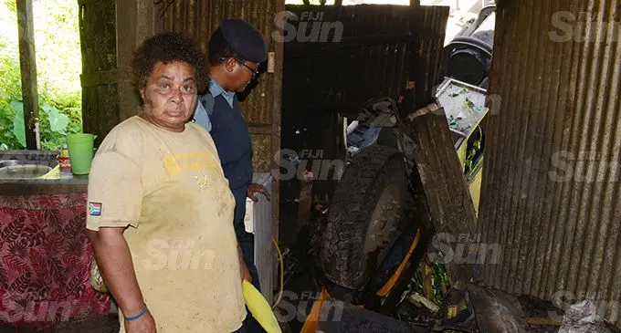 Ani Katonivere (left) is lucky to be alive as the a bus veered of the road and landed on her house killing two passengers in the bus at Lakena Hill in Nausori on 9 October, 2019.  Photo: Ronald Kumar