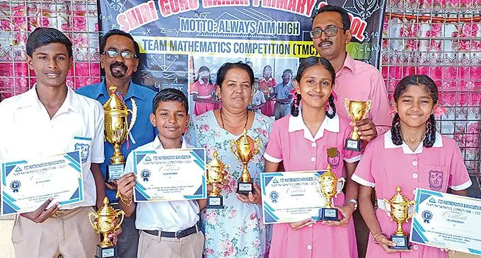 From left: Shiri Guru Nanak Khalsa Primary School Year Eight students, Danish Prasad, Aarav Chand, Taniska Lal and Ishita Lata with their teachers Kamlesh Karan, Ashweeni Dutt and Rajesh Kumar celebrate their win in Labasa on August 19, 2024. Photo: Shratika Naidu