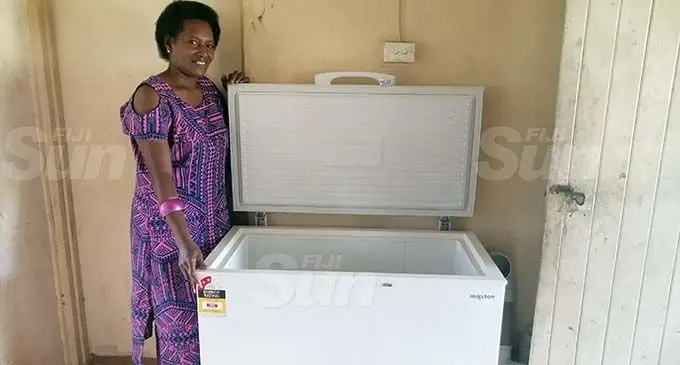 Timaima Racagica shows off her new freezer at her home in Vunitogoloa Village, Ra. Photo: Susana Hirst-Tuilau.