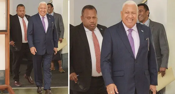 Minister for Defense Inia Seruiratu and Prime Minister Voreqe Bainimarama outside Parliament on August 30, 2022. Photo: Ronald Kumar.