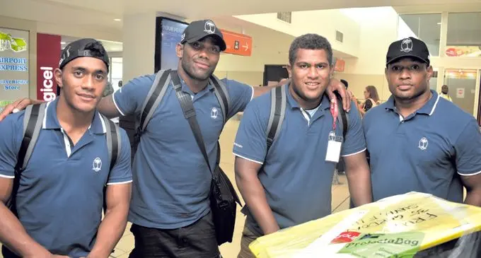 Fiji Giants Jone Manu, Mosese Voka, Ratu Vere and Peni Raidre at the Nadi International Airport yesterday. Photo: WAISEA NASOKIA