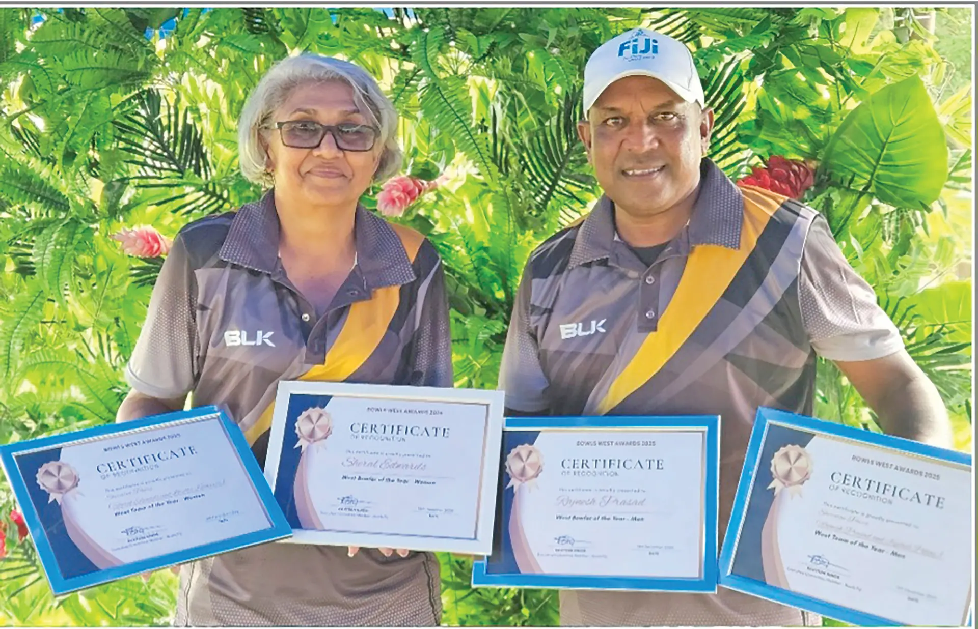 Sheral Edwards (left) and Rajnesh Prasad with their awards on December 13, 2025.