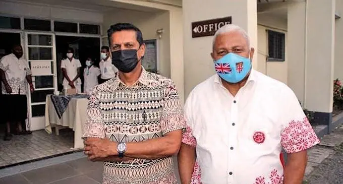Natabua High School principal, Viren Sharma with Prime Minister, Voreqe Bainimarama.