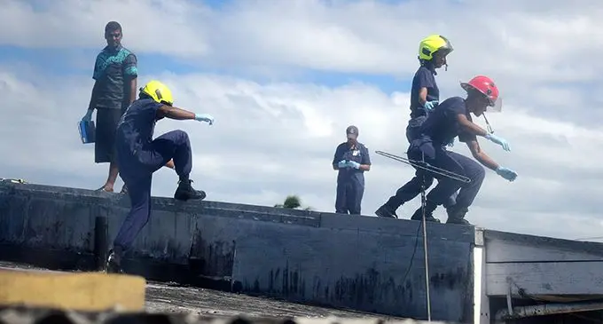 National Fire Authority and Police Forensic officers investigate a fatal fire incident in Lami town on July 22, 2020. Photo: Ronald Kumar.