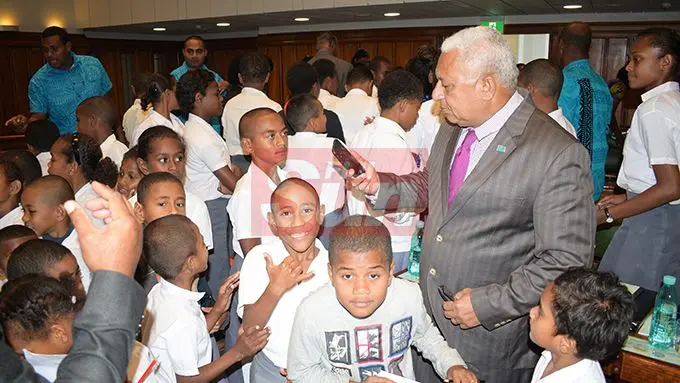 Prime Minister Voreqe Bainimarama with visiting students, teachers and parents of Nukui Village Primary School of Rewa in Parliament on August 7, 2019. Photo: Ronald Kumar.