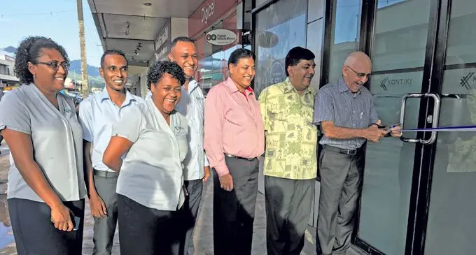Kontiki Finance chairman Daryl Tarte cuts the ribbon as he stands with the Gurbachan Singh Memorial Trust chairman and trustee Charan Jeath Singh, Labasa Chamber of Commerce and Industries president Satish Kumar and staff of Kontiki Finance Labasa branch on Friday, February 23. Photo: Shratika Naidu