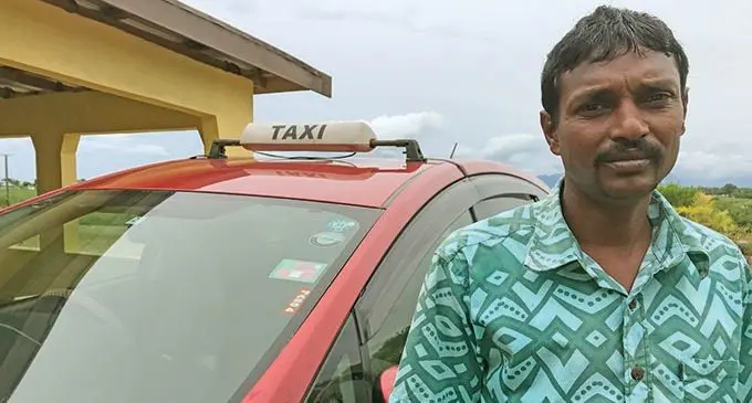 Navinesh Chetty with his taxi at his home in Sonaisali, Nadi on December 16, 2020.  Photo: Waisea Nasokia