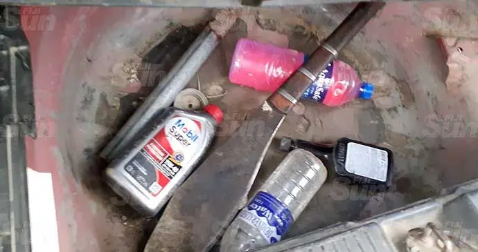 A cane knife was also found at the back of the taxi by Police. Photo: Ronald Kumar