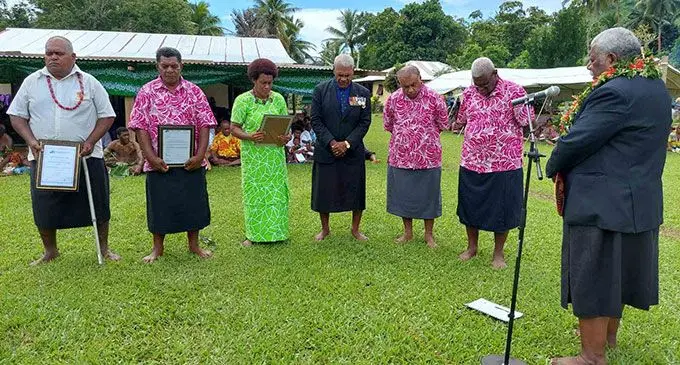 President of the Methodist church of Fiji Reverend Ili Vunisuwai blessing the completion certificate of Nakasaleka Methodist church at Nakoronawa Village in Nakasaleka, Kadavu. Photo: Wati Talebula-Nuku