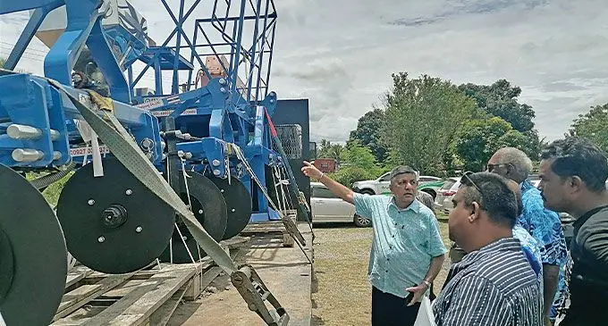 Minister for Sugar Charan Jeath Singh with Ba farmers and the new farm machine in Ba on November 8, 2024. Photo: Mereleki Nai