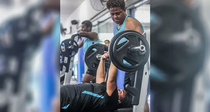 Rooster Chicken Fijiana XVs front row players, hooker Vika Matarugu (right) assists prop Iris Verebalavu during their gym session in Auckland, New Zealand on October 4, 2022. Photo: FRU Media