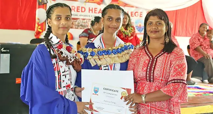 Twins Honglin Patrica Fong and Michell Lyka Fong and Rohini Ragni Mala at Sacred Heart College on December 4, 2024. Photo: Jone Salusalu