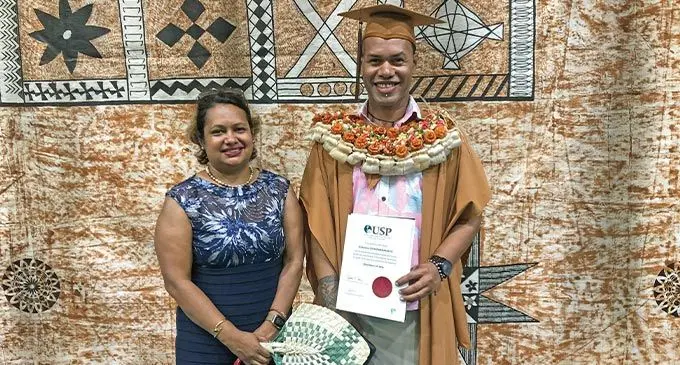 University of the South Pacific graduate, Ratulevu Soronakadavu, with his sister, Racheal Bale. Photo: Josefa Babitu
