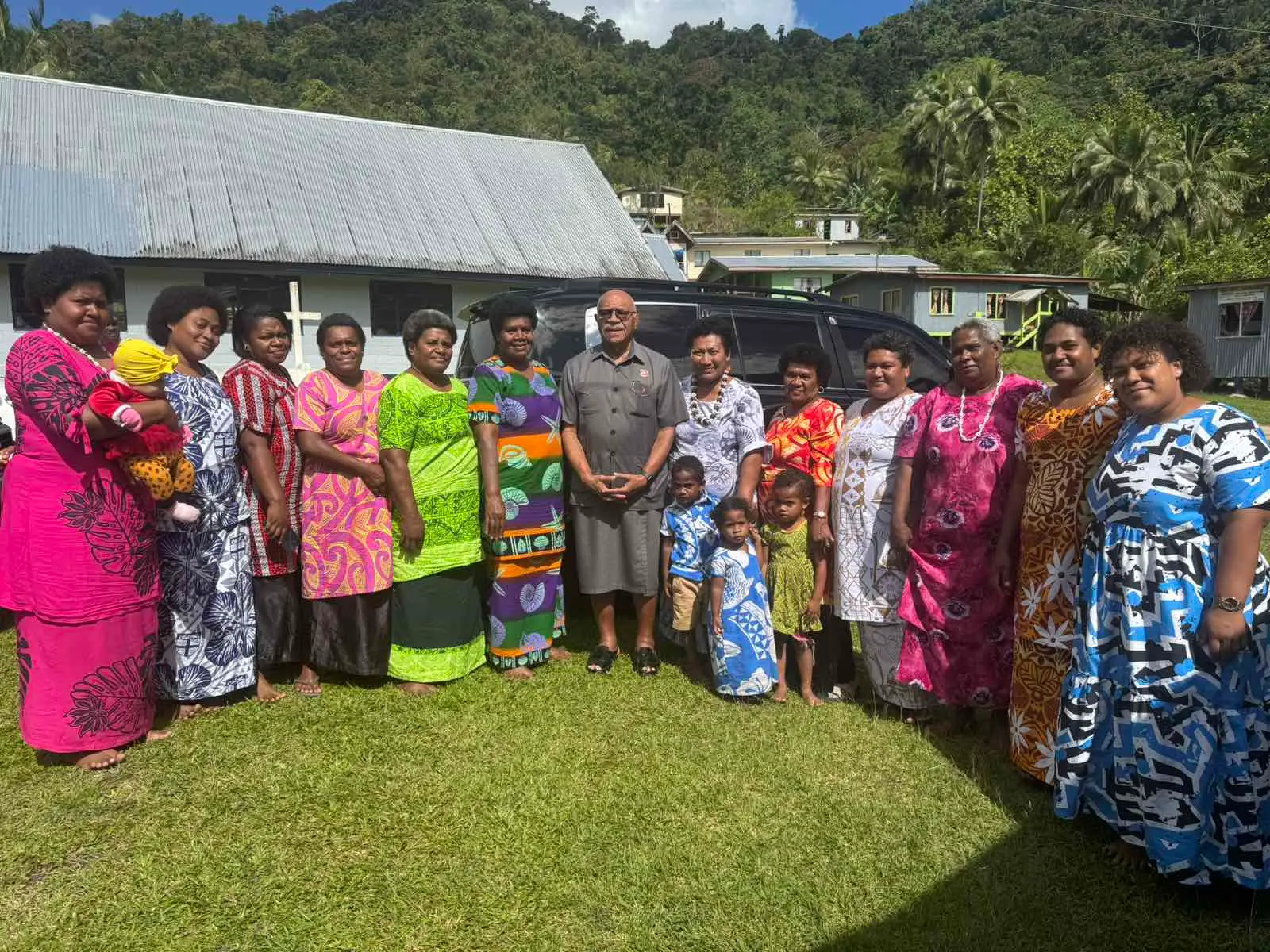 Prime Minister Sitiveni Rabuka (middle) with womens from Wailotua Naba Dua Village in Wainibuka on October 21, 2026.
