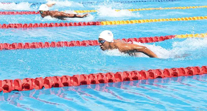 Hansel McCaig (closest to camera) of the Great Whites Sharks club on his way to winning the 50 metres Butterfly during the Long Course Grand Prix 3 at the Damodar Aquatic Centre, Suva on March 16, 2019. Photo: Anasilini Natoga