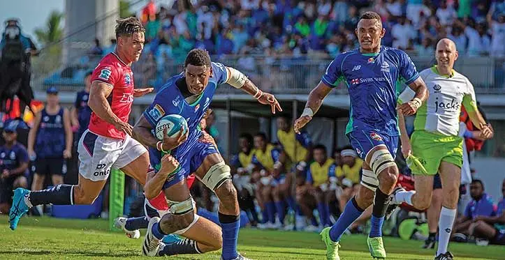 Swire Shipping Fijian Drua flanker Kitione Salawa in possession against Melbourne Rebels with team mate Vilive Miramira closing in to support at the HFC Bank Stadium, Suva on April 1, 2023. Drua won 38-28. Photo: Leon Lord