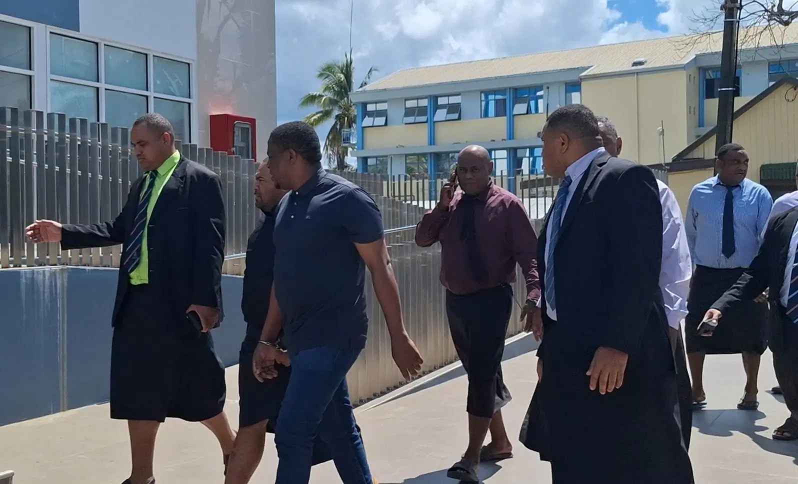 Six men, including law enforcement and customs officials, have been remanded in custody until 4pm today, pending surety approval.