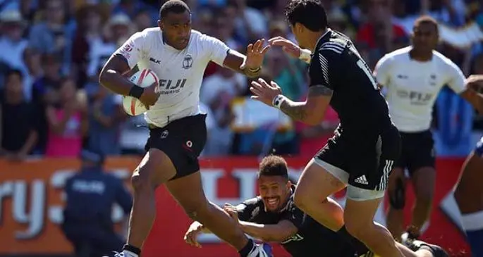 Fiji Airways Fijian 7s utility Isake Katonibau (with ball) breaks away from Ardie Savea during the 2015/16 World Sevens Series. He is the co-founder of AYI Rugby where they develop players with discipline at the way they train.