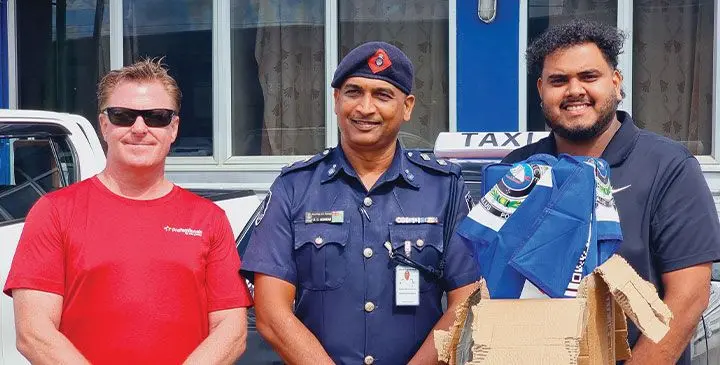 Divisional Police administration officer North, Inspector Rakesh Goundar (middle), donor, Fiji Real Estate Professionals owner/co-director, Baron Bruno, and work colleague during the tent handover in Labasa recently. Photo: Sampras Anand