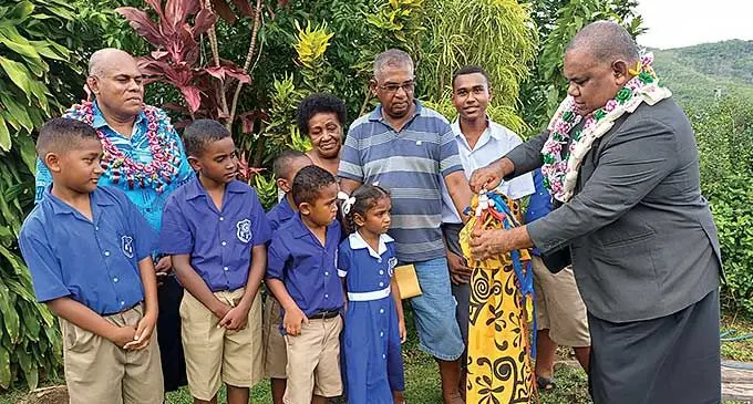 Assistant Minister of Rural and Maritime Development, Disaster Management Jovesa Vocea (right), accompanied by residents, handed over a water project at Korotari, Labasa, on February 1, 2024. Photo: Shratika Naidu
