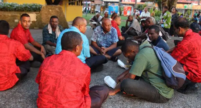 Members of the Strategic Headquarters (SHQ) team with the members of community and street dwellers at Ratu Sukuna Park, Suva on February 22, 2018. Photo: RFMF Media Cell