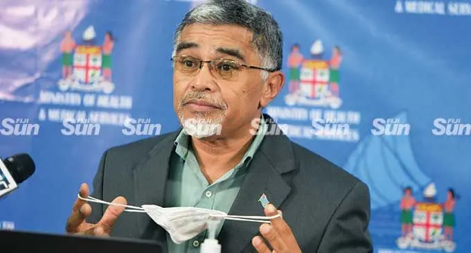 Ministry of Health Permanent Secretary Dr. James Fong shows the proper way of wearing the mask on April 22, 2021. Photo: Ronald Kumar