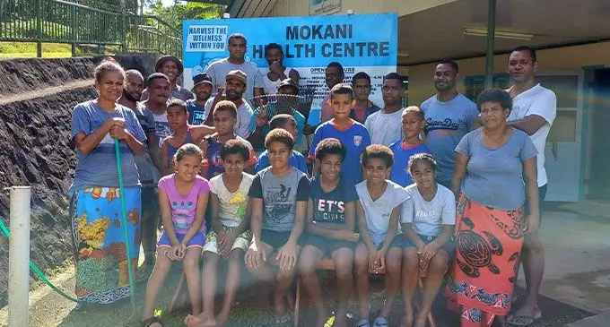 Members of the Mokani Youth Club after their cleanup on July 23, 2022.