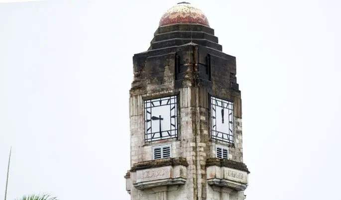 The clock at Government Building shows different time on each clock. Photo: Ronald Kumar.
