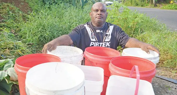 Tacirua Settlment resident, Filimoni Ratoto, waiting for water carting truck following the water cut in Tacirua, Tamavua on April 13, 2023. Photo: Ronald Kumar