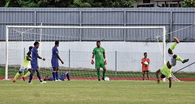 Dejected Lautoka players watch as James Nawo of Henderson Eels celebrate after scoring the winning goal at the OFC Champions League clash at Churchill Park in Lautoka on February 13, 2019. Photo: WAISEA NASOKIA