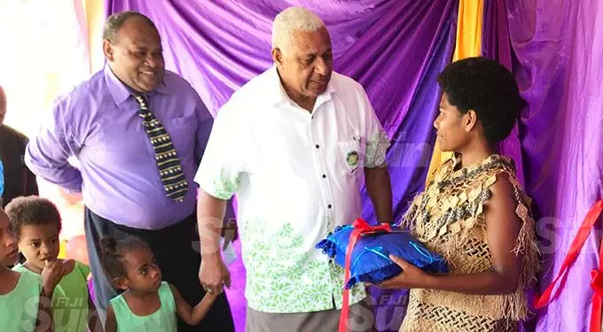Prime Minister Voreqe Bainimarama chats with Nadi District School head girl Salaseini Balenaisa during the opening of the the early childhood education centre at the school on September 29, 2020. Photo: Shratika Naidu