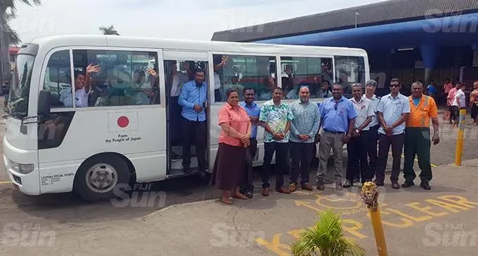 Students of Lautoka School for Special Education inside their bus with the Sunshine Special School head teacher, Julia Kabu (first from left), Lautoka School for Special Education head teacher, Kailash Pillay (third from left) the Lautoka City Council chief executive officer, Mohammed Anees Khan (fourth from left) and other school supporters at the new bus bay at the Lautoka Bus Stand on September 16, 2020. Photo: Nicolette Chambers