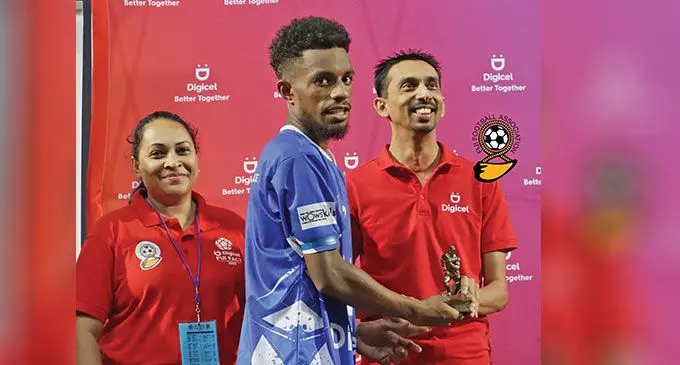 Lautoka Blues midfielder Aporosa Yada received his Gold Ball Best Player award from Digicel Fiji chief executive officer Farid Mohammed at the HFC Bank stadium. Photo: Fiji Football Association